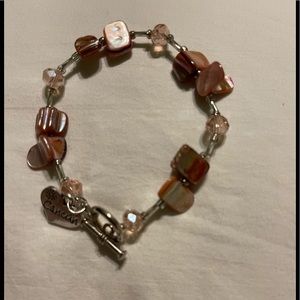 Mother of Pearl with Cancun charm bracelet coral and pink with silver tone beads